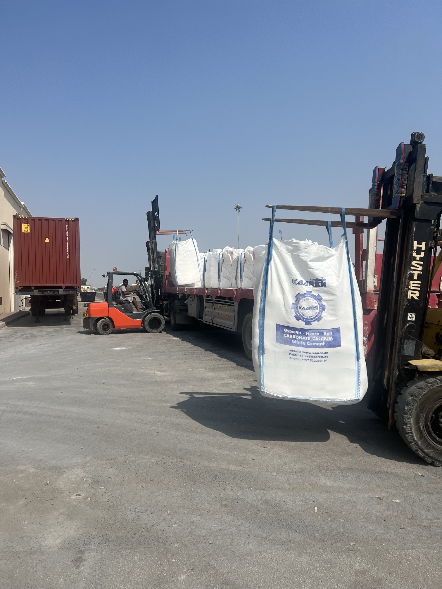 Loading gypsum jumbo bags on truck